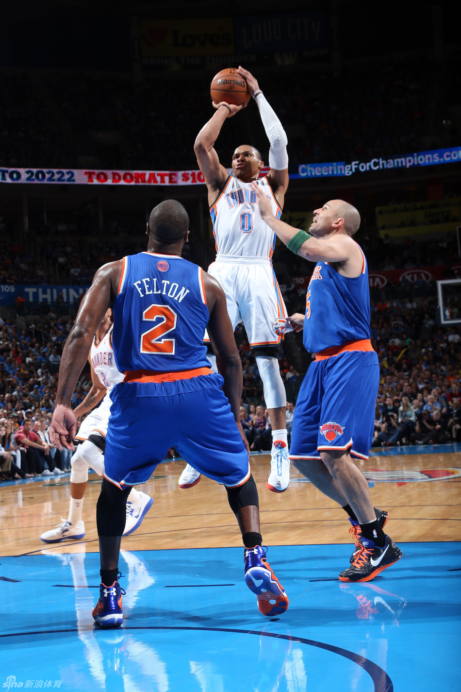 Westbrook makes a jumper in front of Jason Kidd.