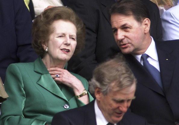 Thatcher and IOC President Jacques Rogge watched Wimbledon Open in 2002.