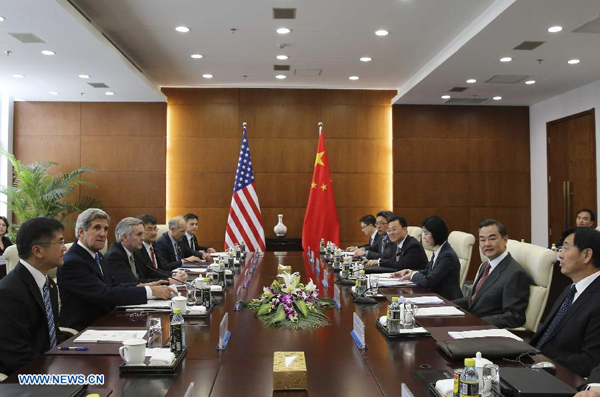 Chinese Foreign Minister Wang Yi (2nd R) and U.S. Secretary of State John Kerry (2nd L) hold talks in Beijing, capital of China, April 13, 2013. [Xinhua]