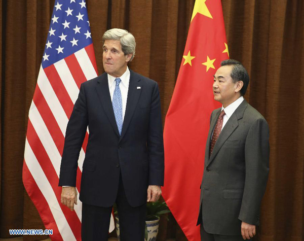 Chinese Foreign Minister Wang Yi (R) and U.S. Secretary of State John Kerry hold talks in Beijing, capital of China, April 13, 2013. (Xinhua