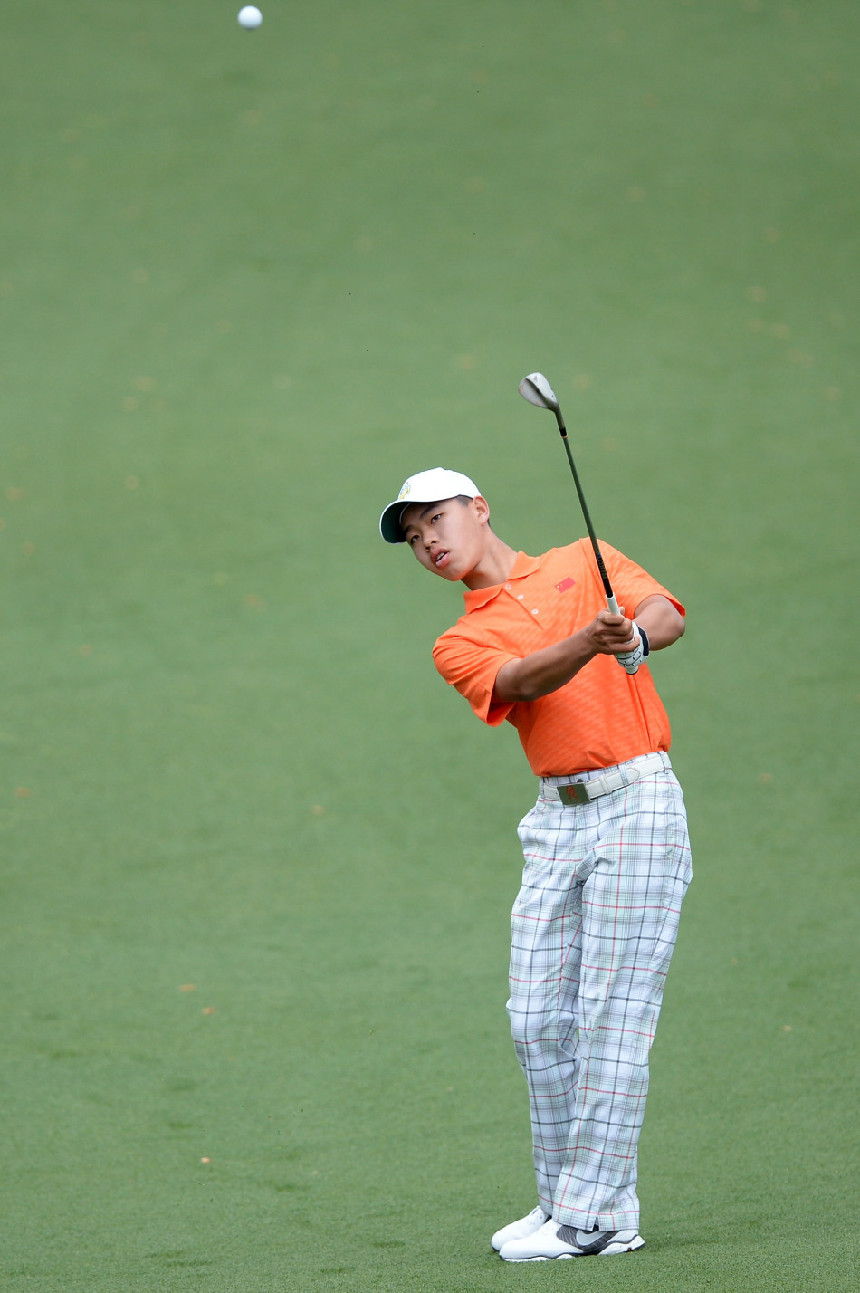 Guan, the youngest player in Masters history, advanced with a three-over par 75 and stood at four-over 148 after 36 holes. [Photo / Sina.com.cn]