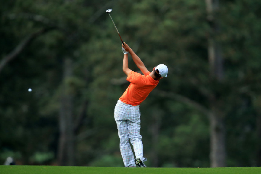 Guan, the youngest player in Masters history, advanced with a three-over par 75 and stood at four-over 148 after 36 holes. [Photo / Sina.com.cn]