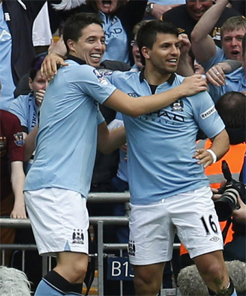 Aguero is congratulated by Nasri after doubling City's lead in FA Cup semifinals.