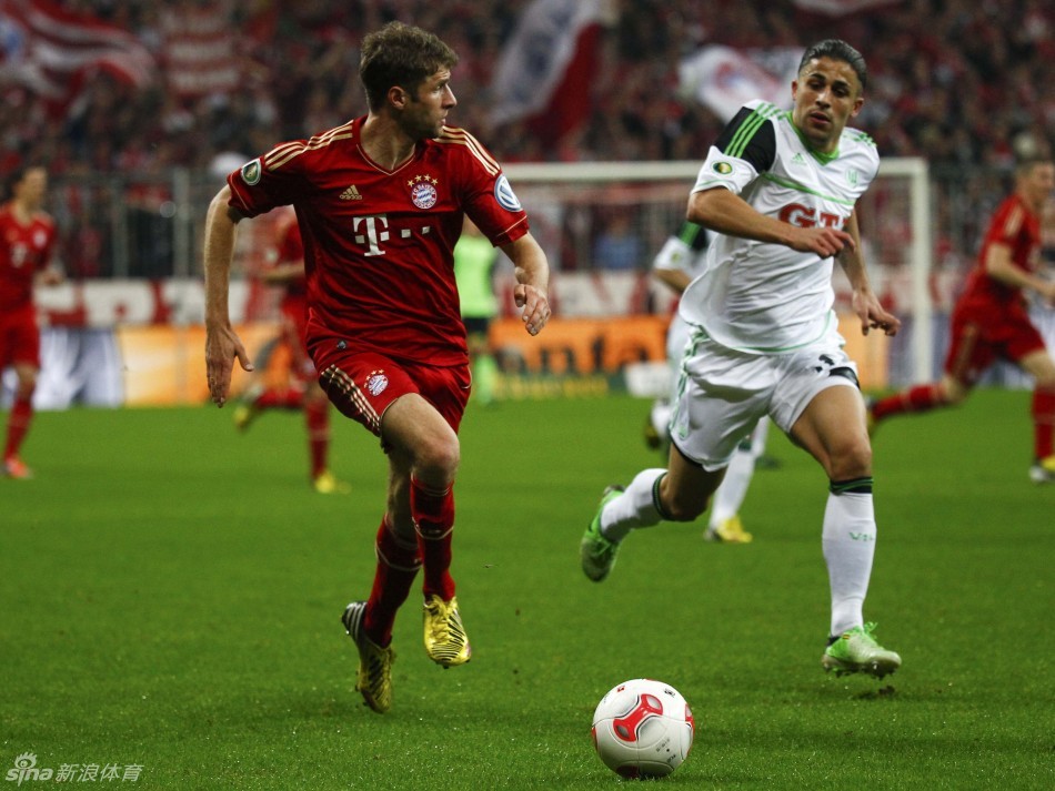 Muller runs with the ball. 