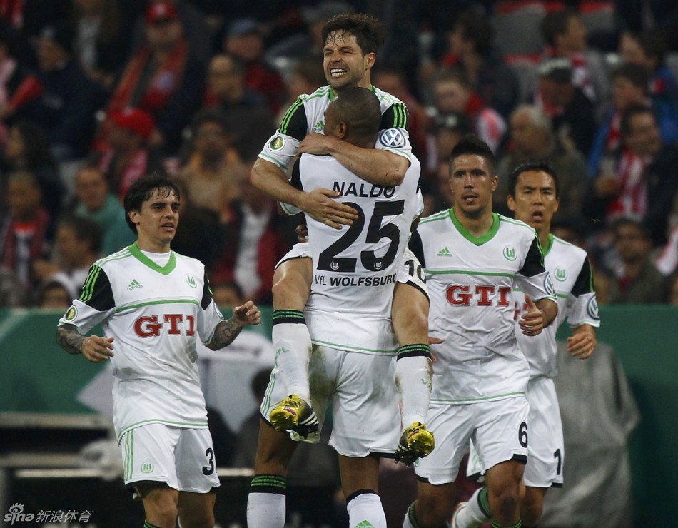 Diego celebrates after pulling one goal back for Wolfsburg. 