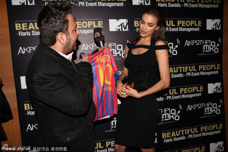 Cristiano Ronaldo's girlfriend Irina Shayak was given the opportunity to cut up a Barcelona shirt with Messi's name on the back after being cornered by a Greek TV host.