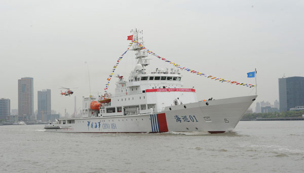 China's largest patrol and rescue ship Haixun 01 is officially put into use on Tuesday morning in Shanghai. [Photo/Xinhua] 
