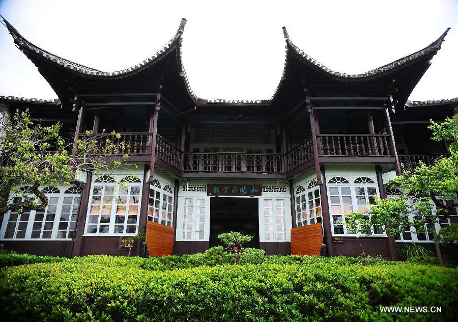 Photo taken on April 16, 2013 shows a library in a village of the ancient townlet Heshun in Tengchong County, southwest China's Yunnan Province. The townlet, featuring time-honored temples and houses, is located three kilometers away from the county seat of Tengchong, where live 6,000 people. (Xinhua/Qin Lang)