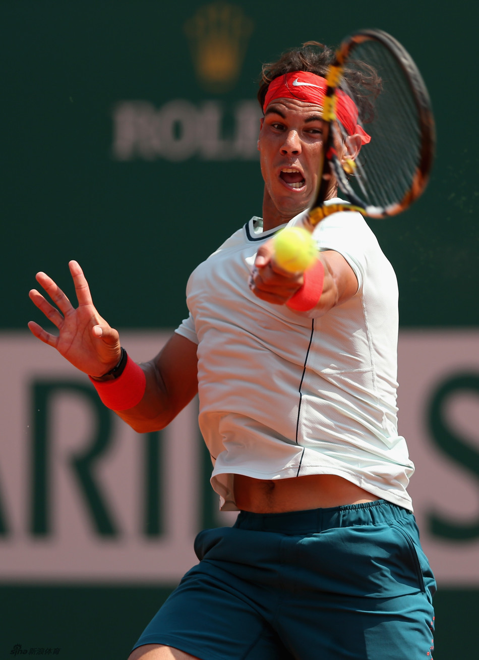 Nadal returns a ball. 