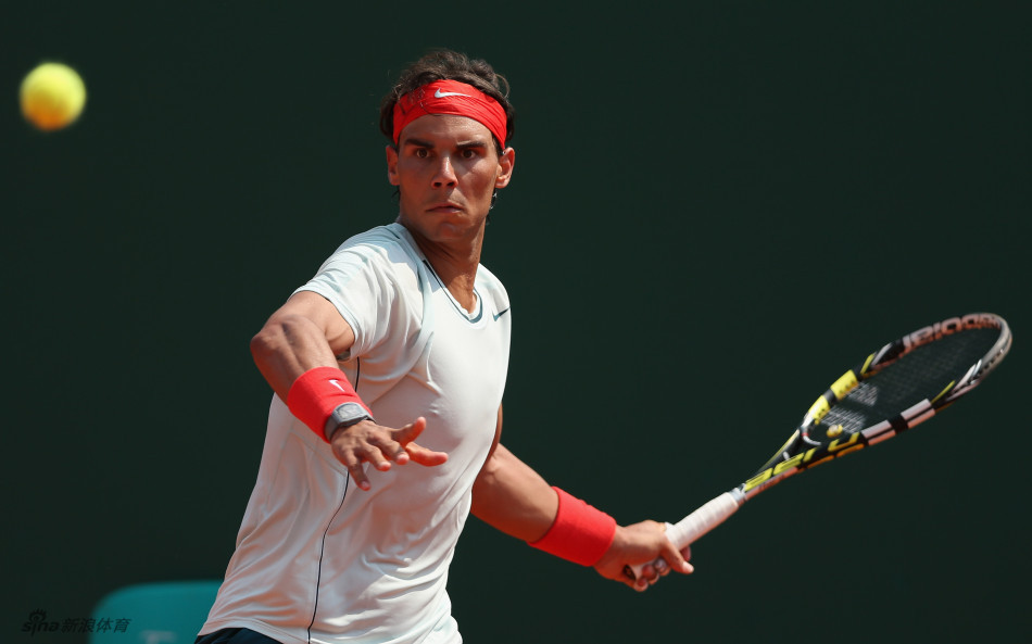 Nadal returns a ball. 