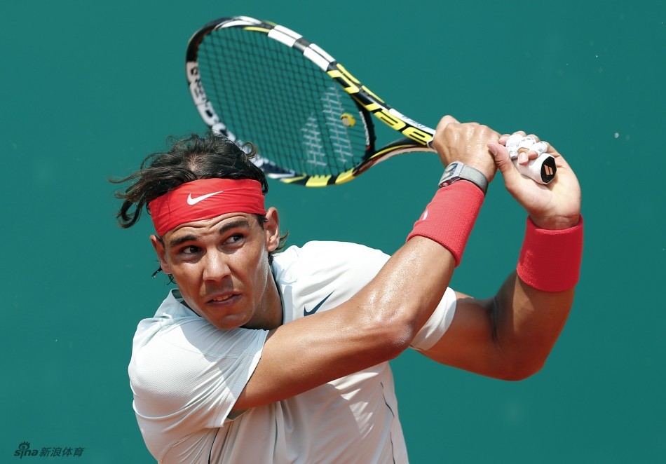 Nadal returns a ball to Kohlschreiber. 