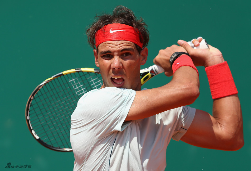 Nadal returns a ball to Kohlschreiber. 