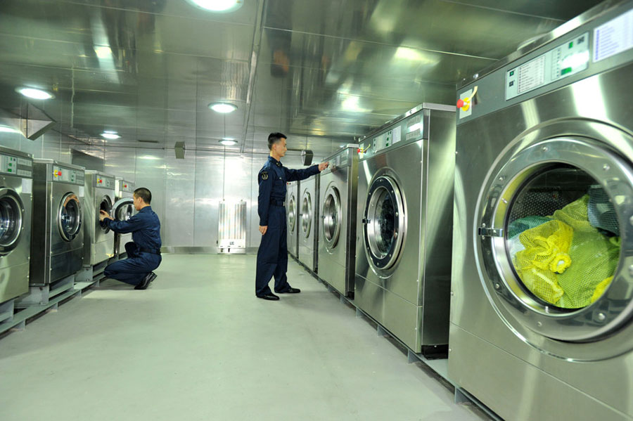 A scene in the laundry room of China's Liaoning Aircraft Carrier on Thursday April 18, 2013. [Photo: CFP]