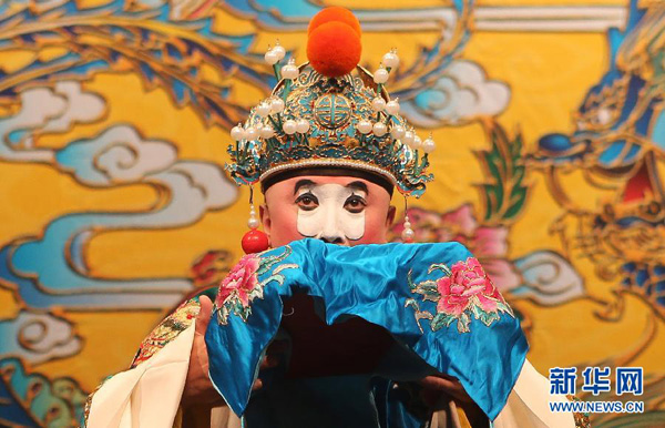 Tianjin City Youth Beijing Opera Troupe (TCYBOT) makes its debut in London Saturday afternoon by enthralling British audience with the traditional Chinese theater performances. [Xinhua]