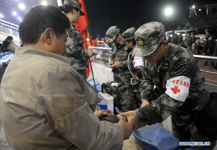 By far, a total of 28,000 people in Baoxing County have been evacuated to safety places. A 7.0-magnitude earthquake hit Sichuan at 8:02 a.m. Saturday Beijing time. [Photo/Xinhua]