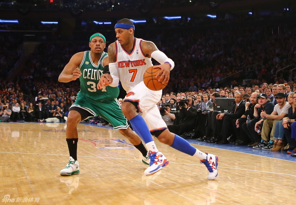Carmelo Anthony drives past Paul Pierce. 
