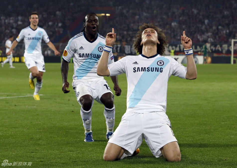 Chelsea's David Luiz (R) celebrates scoring a goal against FC Basel during theEuropa League semi-final first leg soccer match at St. Jakob Park stadium in Basel April 25, 2013.