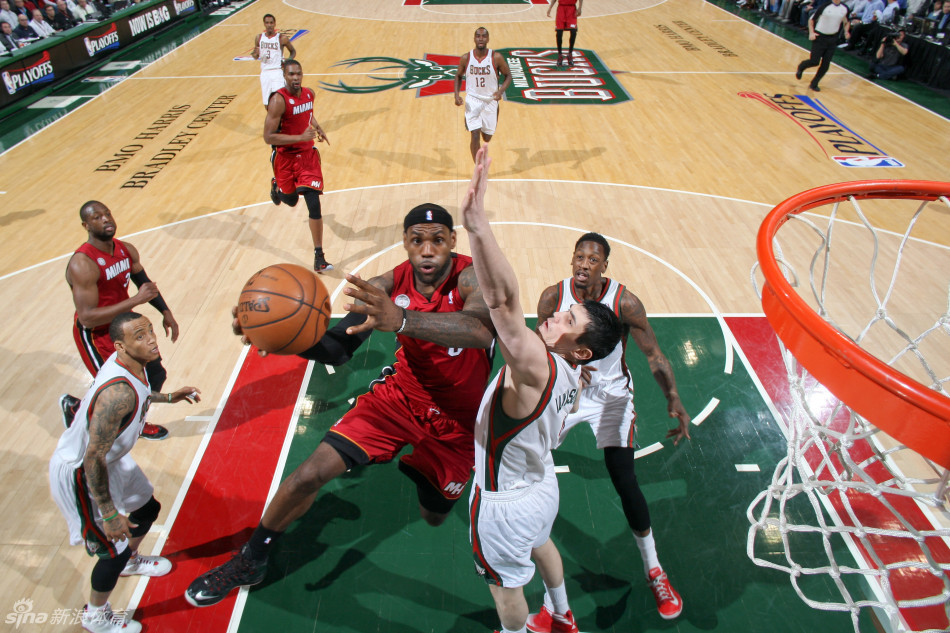 LeBron James goes up for a basket against Ersan Ilyasova in Game 3 of the NBA Eastern Conference first-round series between Miami Heat and Milwaukee Bucks. 