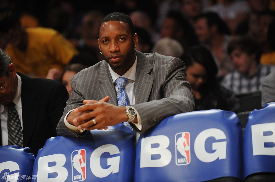 T-Mac sits on the courtside. 