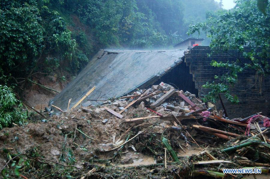 A farm house is seen collapsed at Shuangfeng Town in Bobai County, south China&apos;s Guangxi Zhuang Autonomous Region, April 30, 2013. Floods and landslides triggered by heavy rain have claimed five lives while affecting more than 200,000 people in Guangxi. 