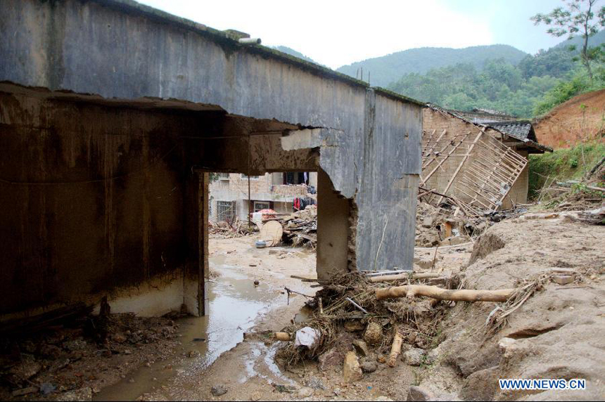 A farm house is seen damaged at Shuangfeng Town in Bobai County, south China&apos;s Guangxi Zhuang Autonomous Region, May 1, 2013. Floods and landslides triggered by heavy rain have claimed five lives while affecting more than 200,000 people in Guangxi.