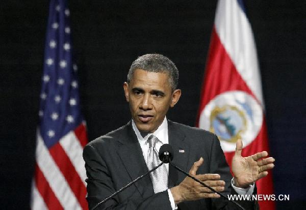 US President Barack Obama speaks at a joint press conference with Costa Rican President Laura Chinchilla after a bilateral meeting, at the National Cutural Center in San Jose, capital of Costa Rica, on May 3, 2013. [Xinhua]
