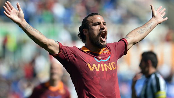  AS Roma's Pablo Osvaldo headed in a corner in added time to put a major crimp in ACF Fiorentina's hopes of a UEFA Champions League place next season.