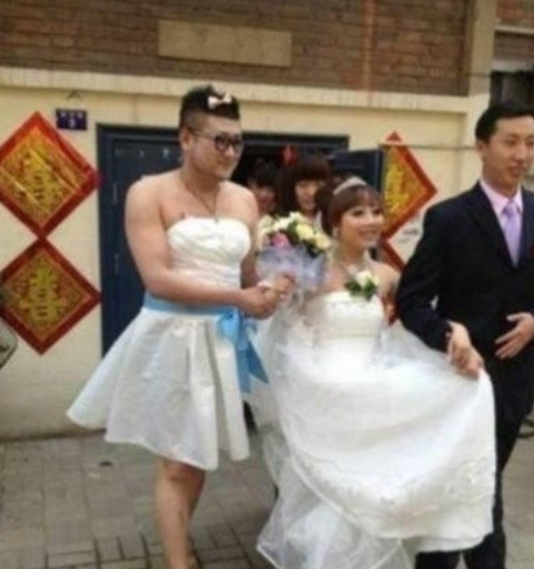 Male Bridesmaid Wears Dress