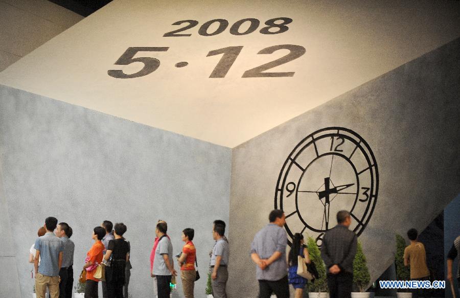 People visit the Wenchuan Earthquake Memorial Museum in the town of Qushan, Beichuan Qiang Autonomous County, southwest China's Sichuan Province, May 9, 2013.