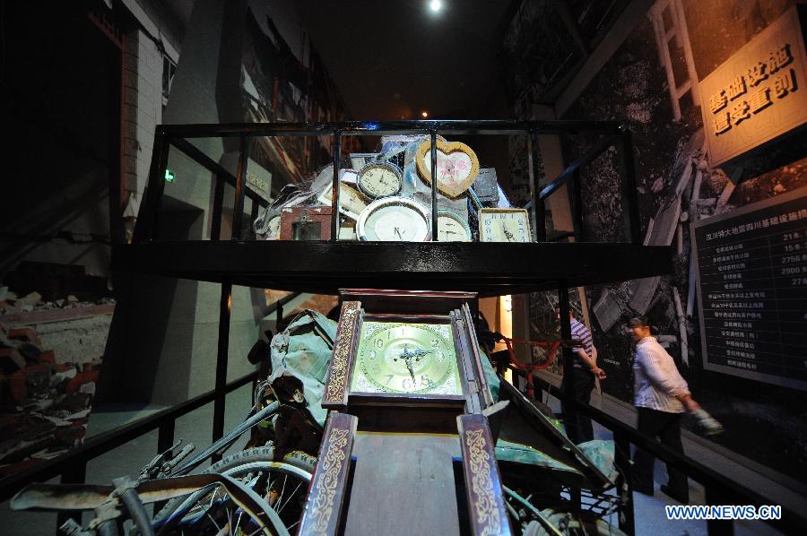 People visit the Wenchuan Earthquake Memorial Museum in the town of Qushan, Beichuan Qiang Autonomous County, southwest China's Sichuan Province, May 9, 2013. 