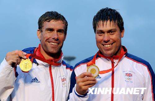 Andrew Simpson (R) won a gold in 2008 Olympics and came second in 2012 in the keelboat star class at London Games.