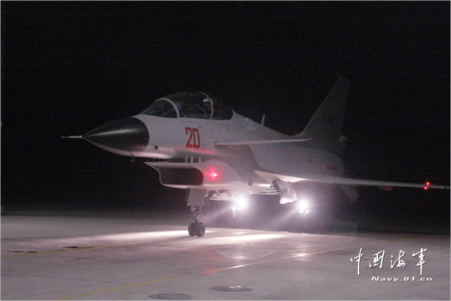  Recently, a flight regiment under the Navy of the Chinese People's Liberation Army (PLAN) organized its new-type fighters to carry out night flight training. [Photo/Chinamil.com.cn]