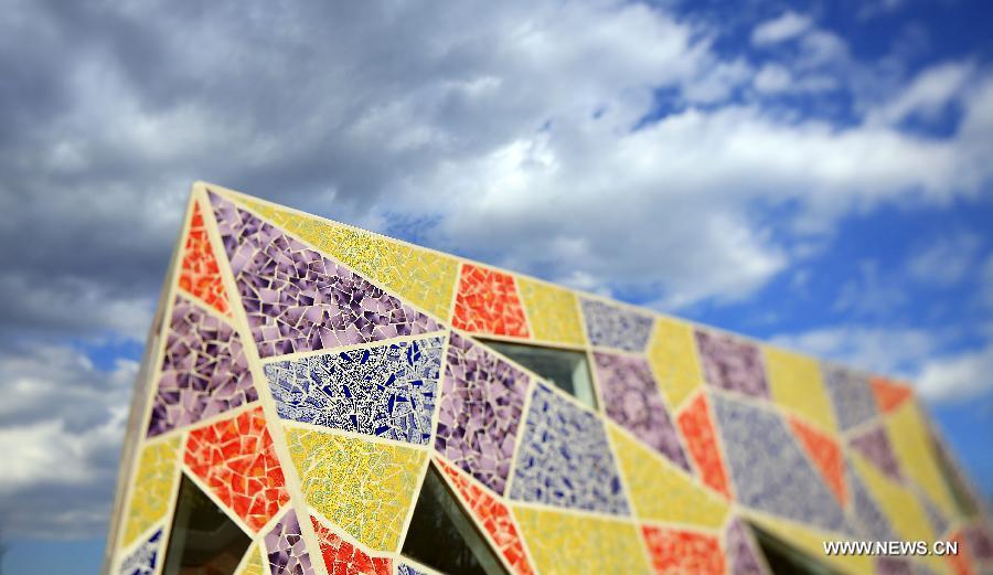 Photo taken on May 10, 2013 shows the main building of a mosaic park in the 2013 World Landscape Art Exposition Jinzhou China, in Jinzhou, northeast China's Liaoning Province. The exposition kicked off on Friday, attracting more than 300 artists from home and abroad. (Xinhua/Yang Qing) 