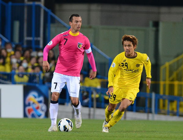 Central Coast Mariners captain John Hutchinson (left) has played in all three of the A-League sides' AFC Champions League campaigns.