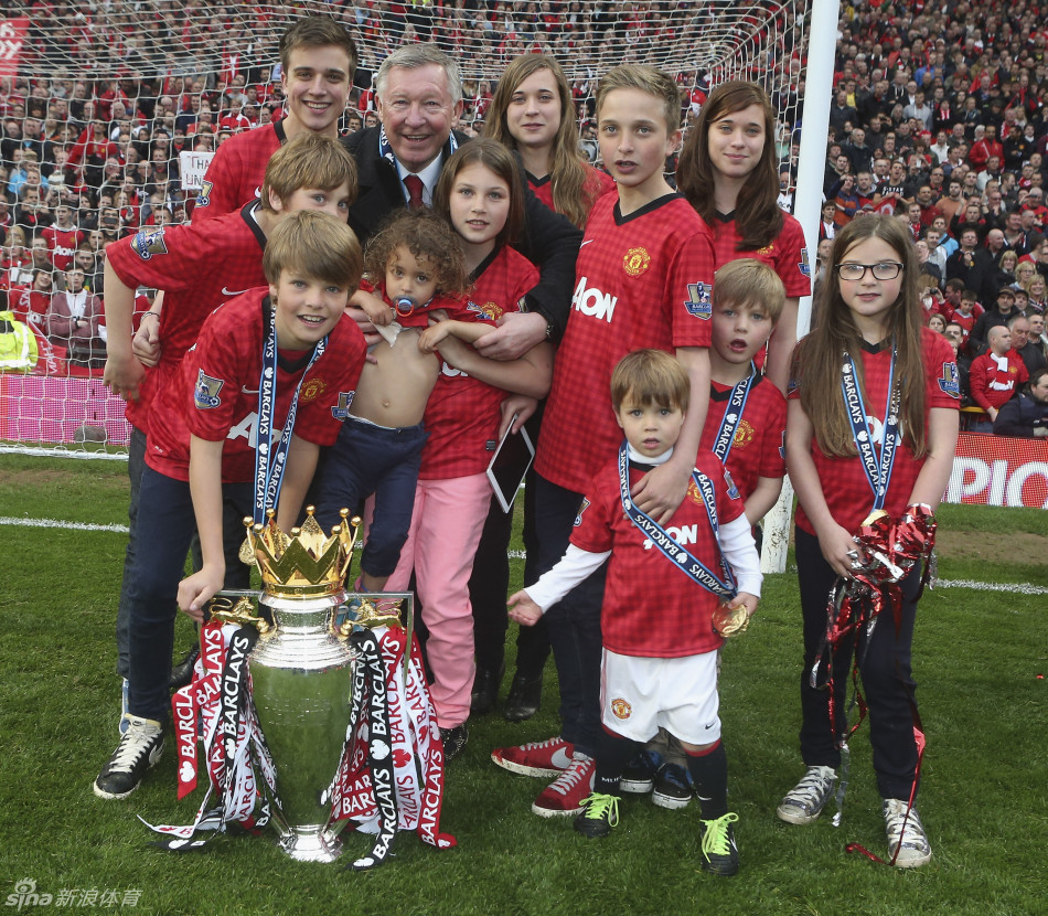 Ferguson was joined on the pitch by his 11 grandchildren following his final victory at Old Trafford.