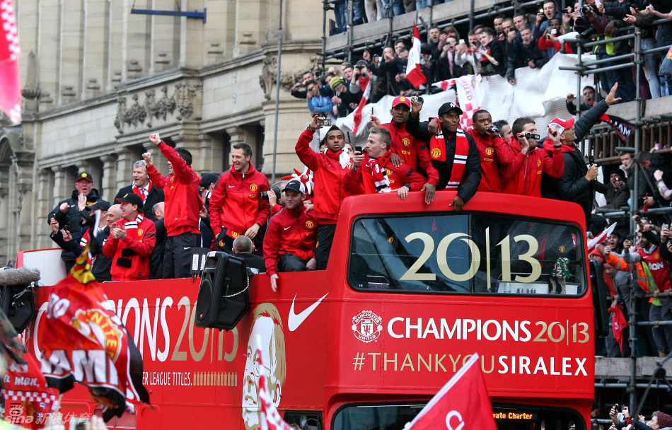 The Manchester United bus arrives in Albert Square.