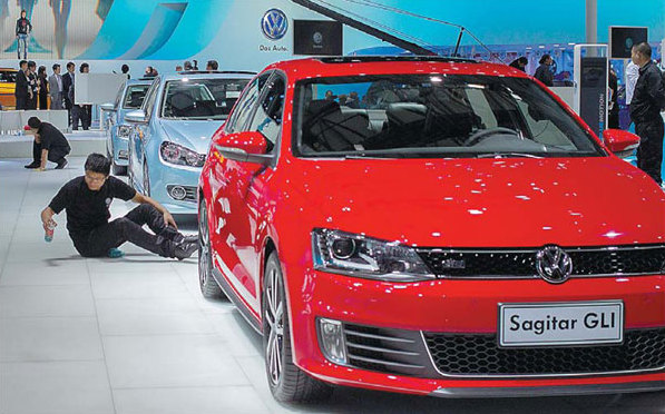 The Volkswagen stand at an auto show in Shanghai. The German company is planning a new production plant in Changsha, Hunan province in Central China to boost its market share in the country. [China Daily]