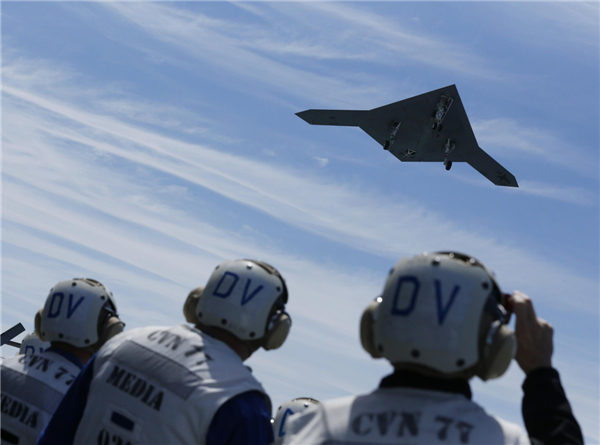 An X-47B pilot-less drone combat aircraft is launched for the first time off an aircraft carrier, the USS George H. W. Bush, in the Atlantic Ocean off the coast of Virginia, May 14, 2013.