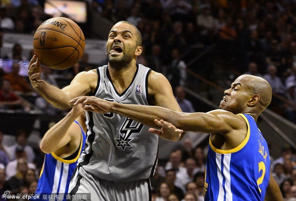 Tony Parker fouled by Jarett Jack when he drives to the basket in Game 5 of NBA Western Conference semifinals between San Antonio Spurs and Golden State Warriors.