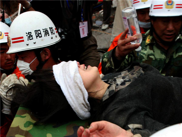 Bian Gangfen was saved from the debris 125 hours after the 2008 Wenchuan earthquake. [Photo / China Daily]