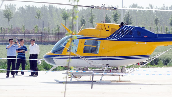 Police investigate on Wednesday an incident that some netizens claimed was 'the country's first case of a hijacked helicopter', in Dezhou, East China's Shandong province. [Photo/China Daily]