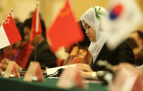 Delegates take part in the Fifth East Asia Gender Equality Ministerial Meeting in Beijing on Wednesday. Some 120 delegates from 13 countries in East Asia attended.[Photo/Xinhua]