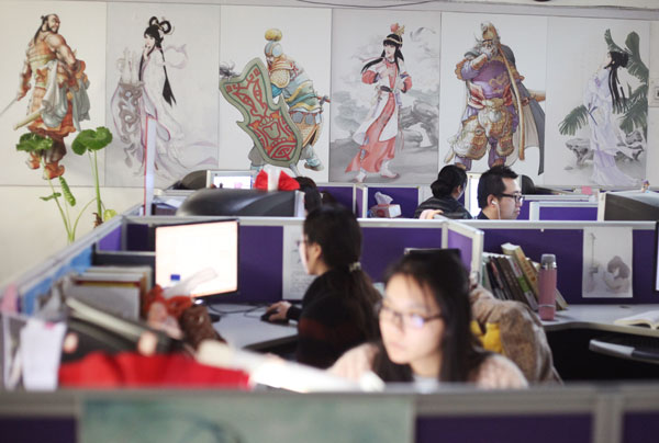 Artists at Chen's studio share his passion for fantasy animation images. [Jia Lei for China Daily] 