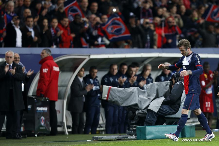 Paris Saint-Germain's English midfielder David Beckham reacts as he is substituted during the French League 1 football match between Paris St Germain and Brest at Parc des Princes stadium in Paris on May 18, 2013. [Wang Lili/Xinhua]