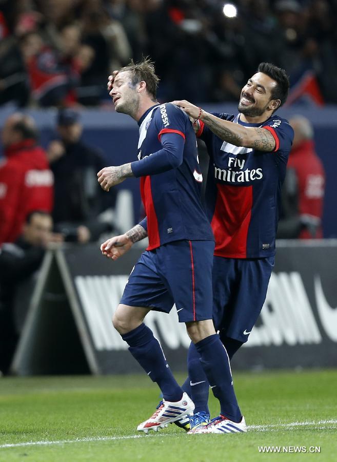 Paris Saint-Germain's English midfielder David Beckham (L) reacts as he is substituted by Ezequiel Lavezzi during a French League 1 football match between Paris St Germain and Brest at Parc des Princes stadium in Paris on May 18, 2013. [Wang Lili/Xinhua]