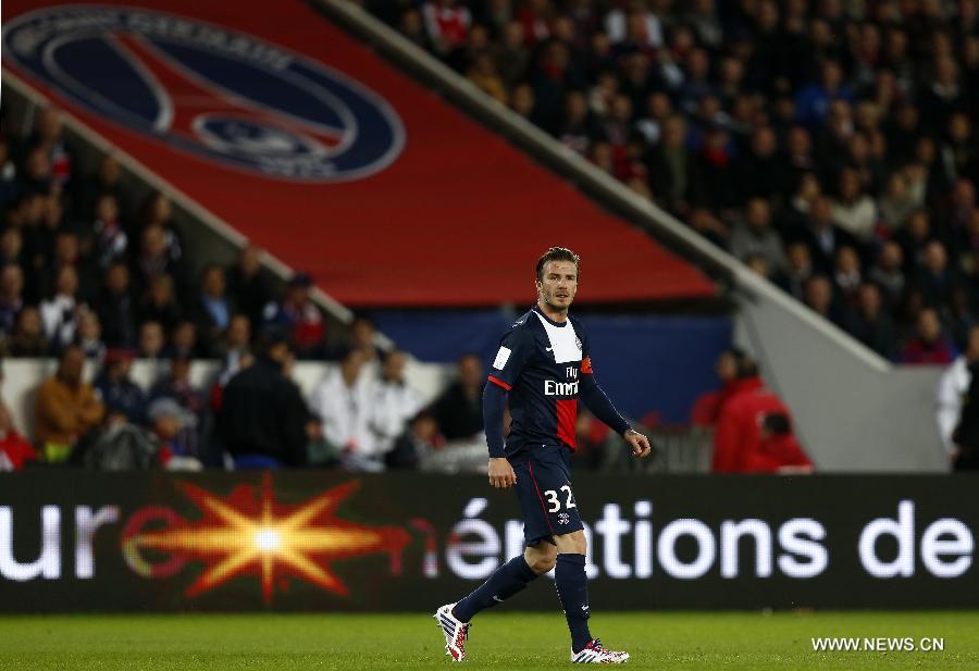 Paris Saint-Germain's English midfielder David Beckham looks on during the French League 1 football match between Paris St Germain and Brest at Parc des Princes stadium in Paris on May 18, 2013. [Wang Lili/Xinhua]