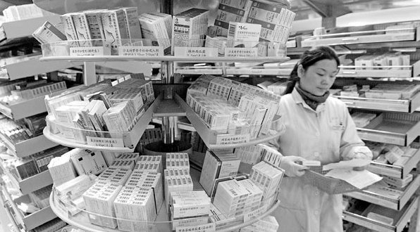 A pharmacist at a hospital pharmacy in Nanjing, Jiangsu province. In 2012, Alliance Boots announced it was buying a 12 percent stake in Nanjing Pharmaceutical Co for about $91 million. Nanjing Pharmaceutical is China's fifth-largest pharmaceutical wholesaler. [China Daily]