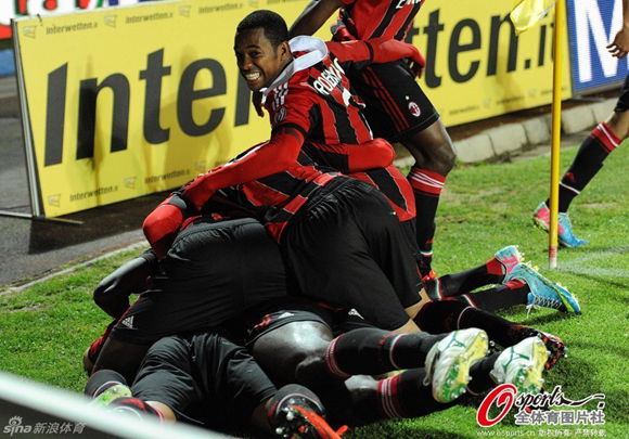  AC Milan players celebrate after Mexes scoring the winner late in the second half.