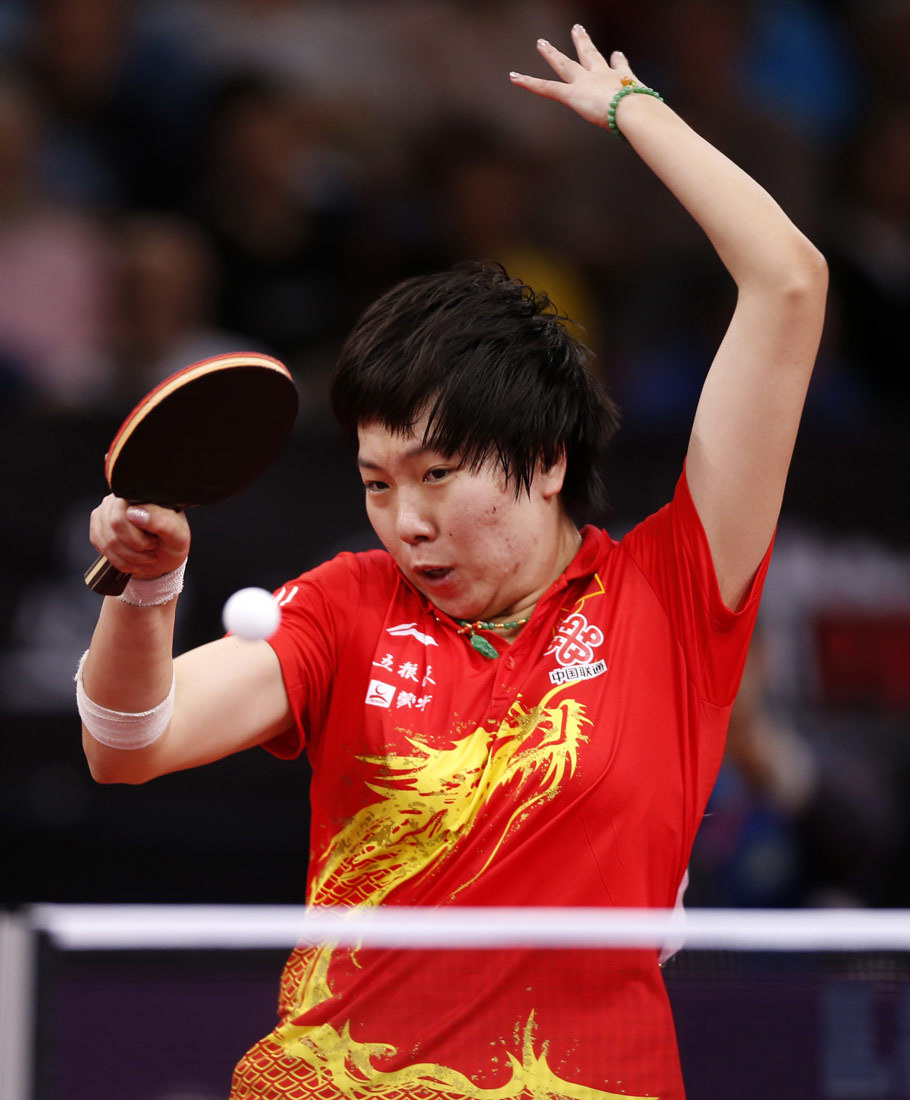 Li returns a ball to Liu Shiwen in the final of women's singles. 