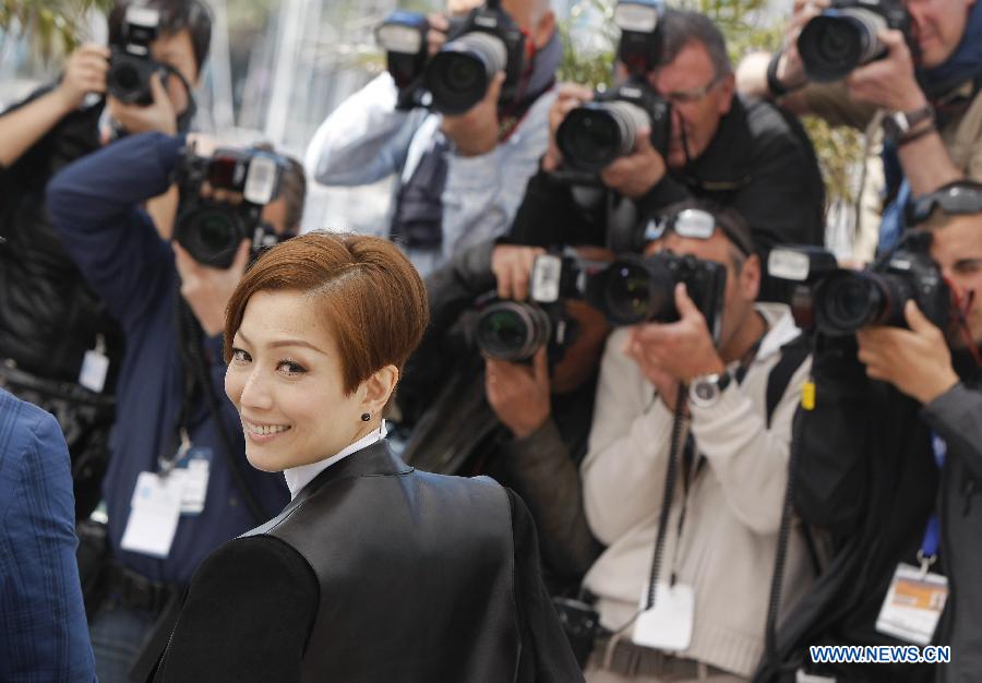 Chinese Hong Kong actress Sammi Cheng poses during the photocall for Hong Kong film 'Blind Detective' at the 66th Cannes Film Festival in Cannes, southern France, on May 20, 2013. The film 'Blind Detective' is presented in Midnight Projections at the film festival. [Zhou Lei/Xinhua]